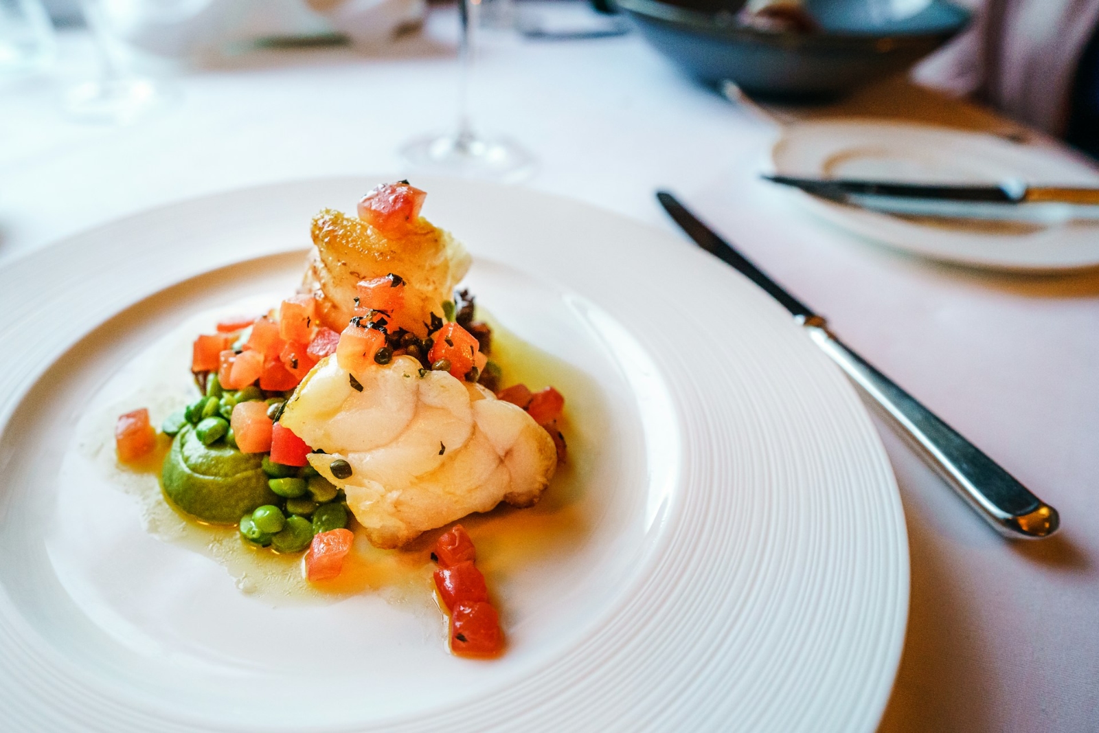 Before the First Bite: The Art of The Bespoke Menu 58 white fish, fava beans, green peas